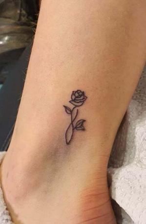 Oneindige roos tatoeage
