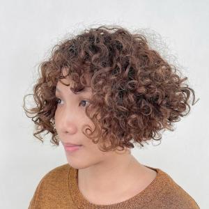 12 најслађих кратких коврџавих фризура за коврчаву косу