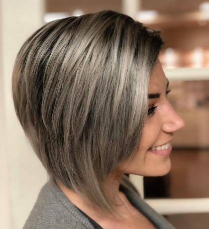 Layered Dimensional Style with Grey Balayage Highlights