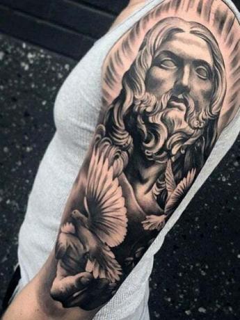 Jezus tatoeage met halve mouw 