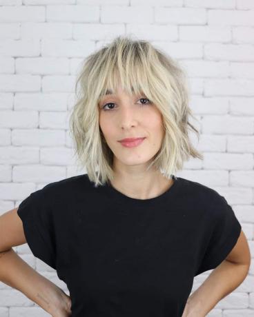 Blond Shaggy Layered Bob with Bangs