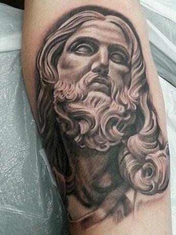 Jesus staty tatuering