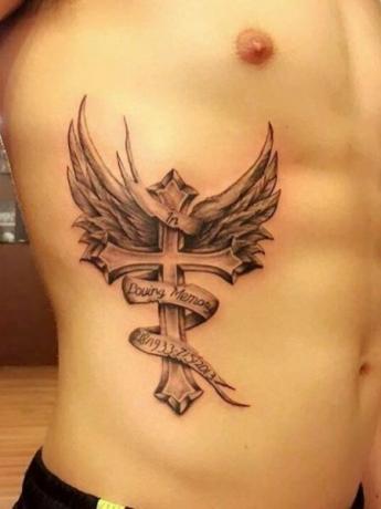 Cross Rib Tattoo