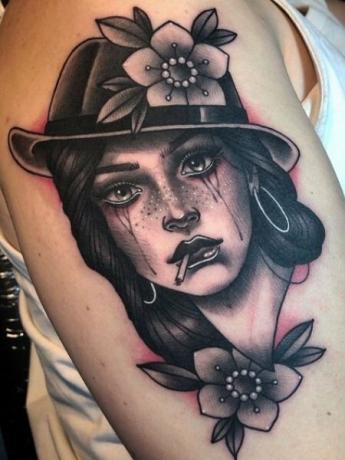 Portrett tatovering på overarm